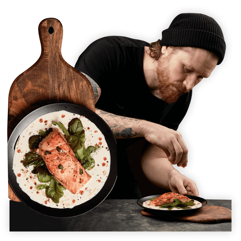 image of a man seasoning